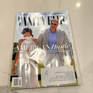 Vanity Fair Rolex Ad with Silver and Black Watch